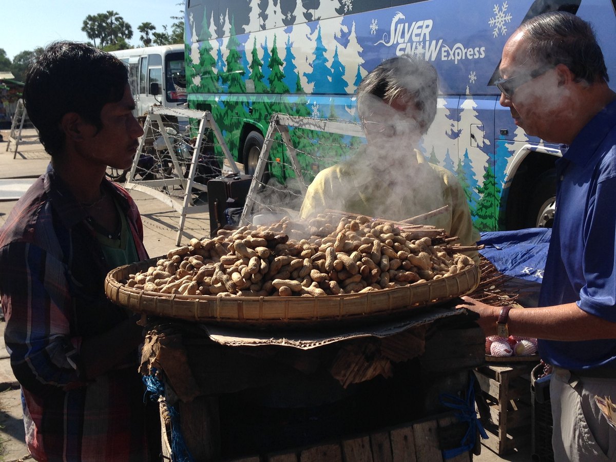 A steamed-peanut vendor on the Yangon–Mandalay expressway, Myanmar