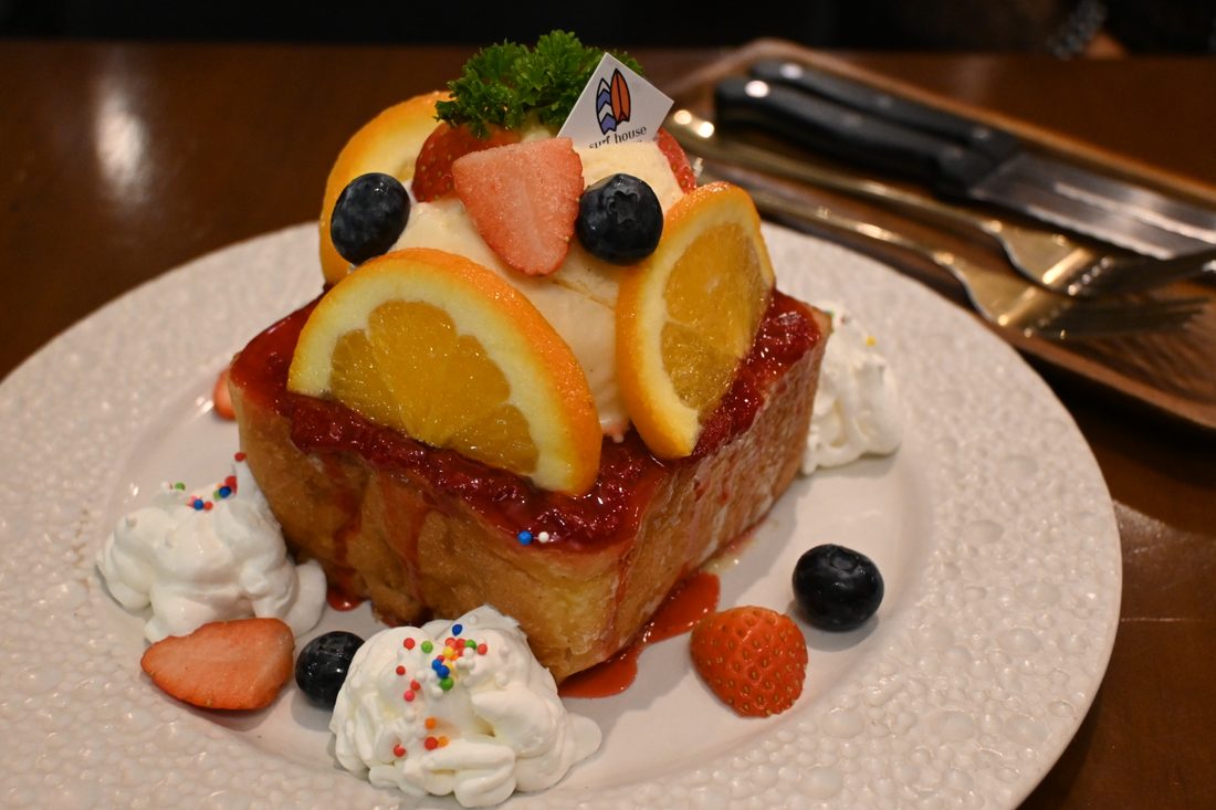 French toast slices, browned, with syrup