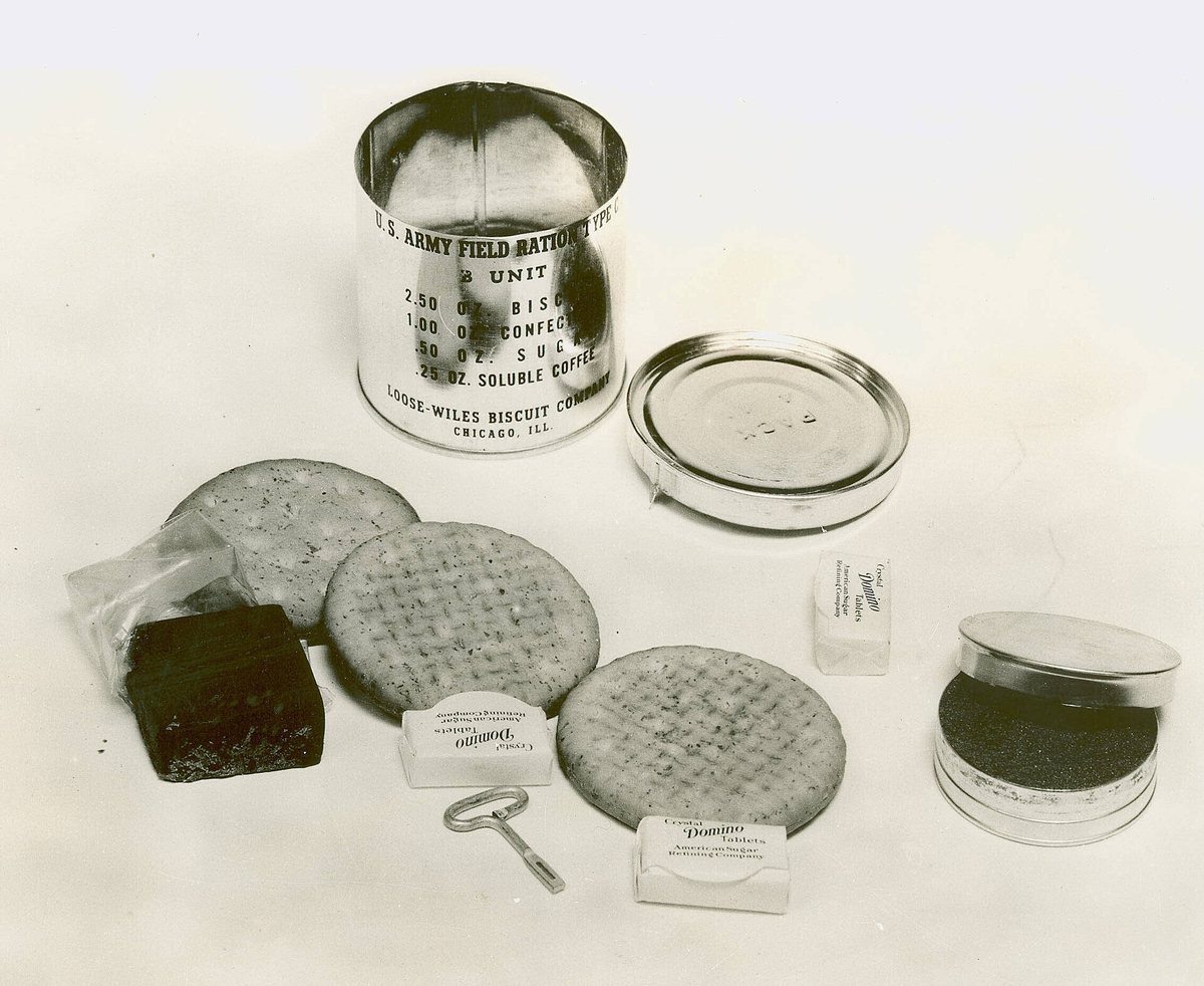 A US Army field ration, opened out — biscuits, confection, and a tin of soluble coffee. This is how a generation of American men learned to take their coffee
