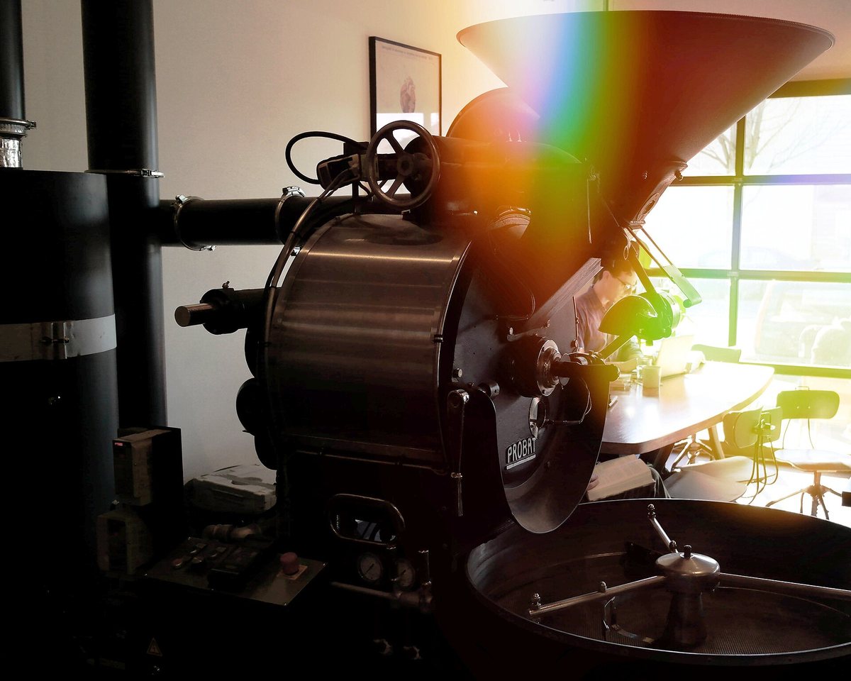 The same class of machine installed in a café, where the roasting is part of the shopfront