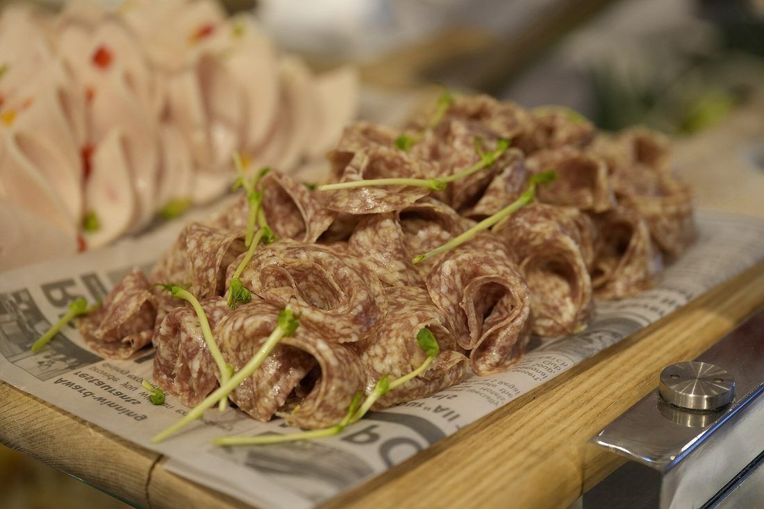 Sliced dry-cured salami. The fermentation and the drying are finished here; getting to this point safely is what the rest of this page is about