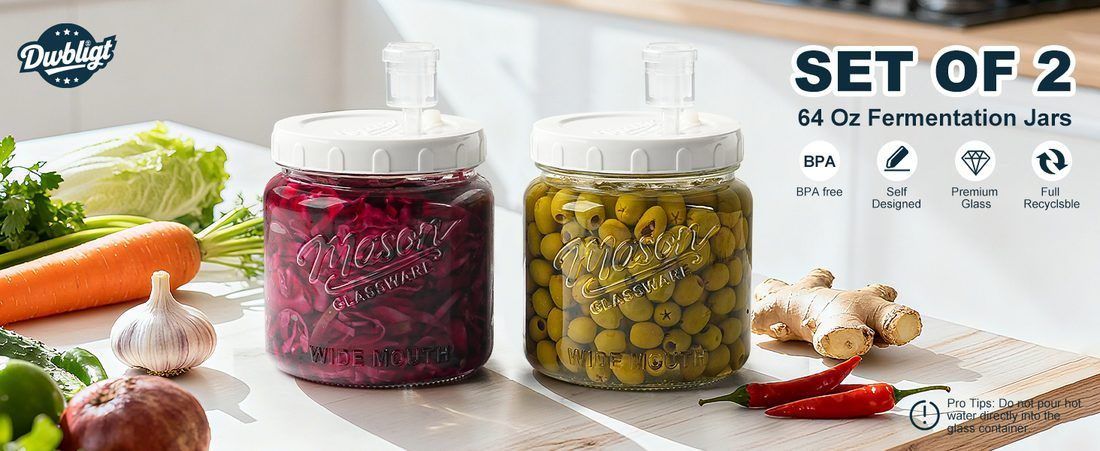 Wide-mouth jars of beets and olives fermenting under airlock lids — the method this page recommends