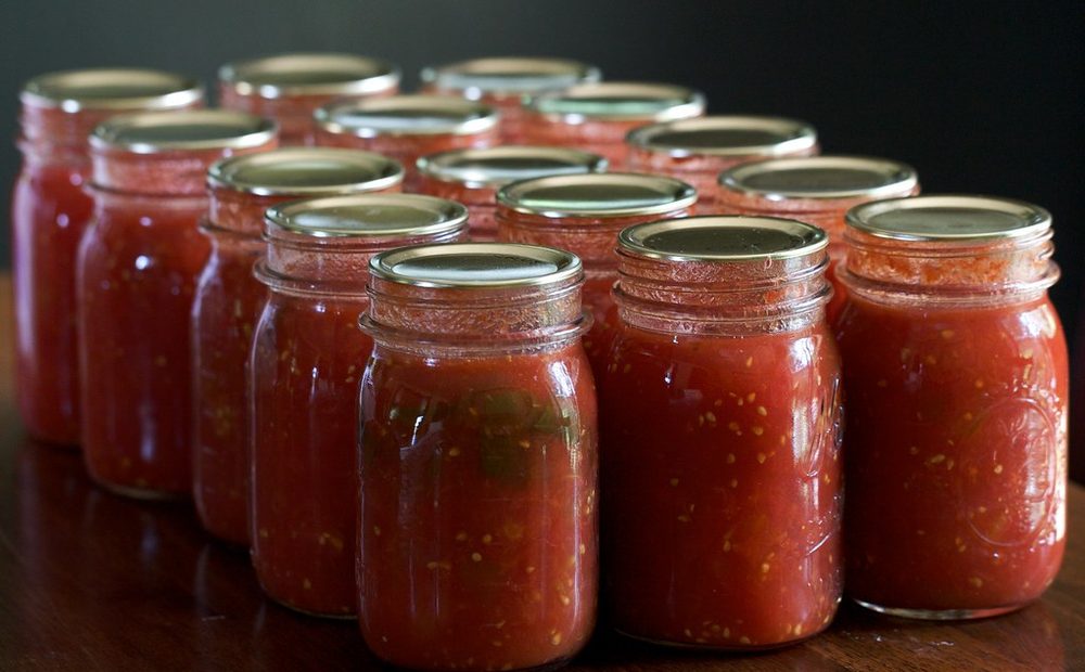 A jam and jelly station — kettle and filled jars (placeholder for my canning station)