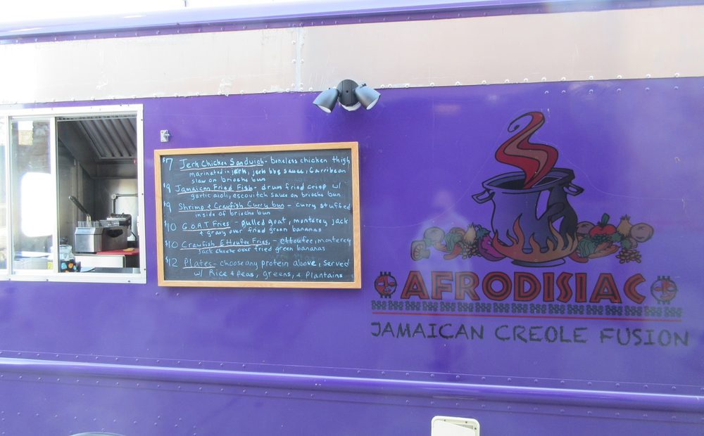 A food truck with the service window open at an event (placeholder for my truck)