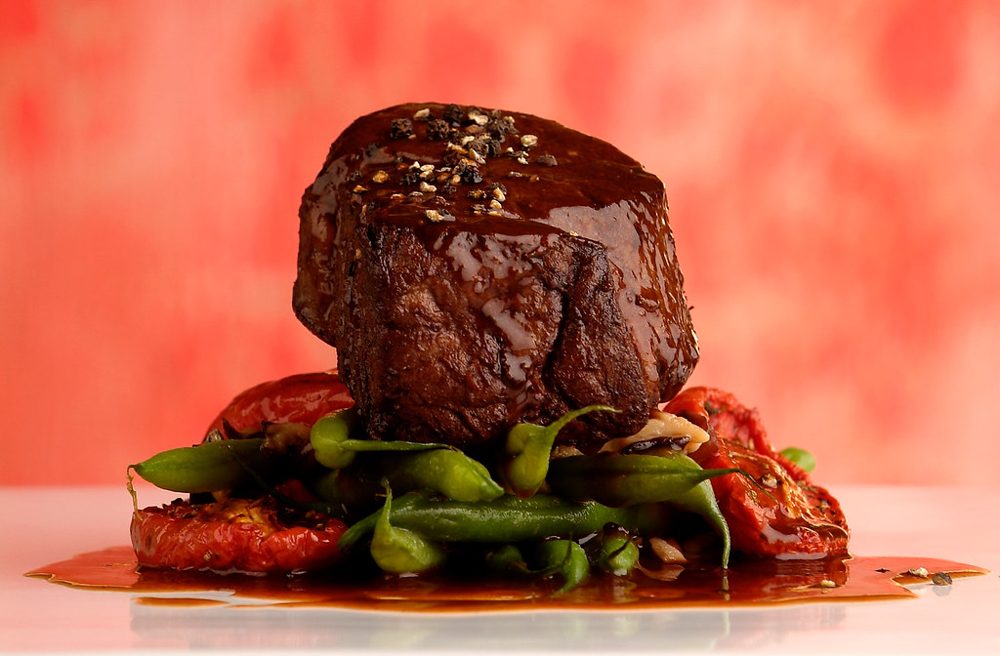 Green Peppercorn Beef Tenderloin with Vinegar-Glazed Leeks