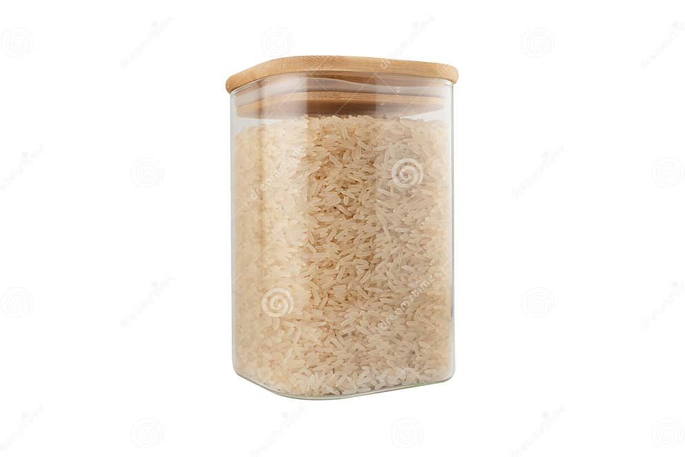 A pantry shelf of rice in clear airtight glass jars — white, brown, basmati, jasmine, and arborio — each labeled, showing the range you might actually keep on hand