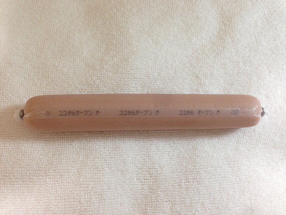 Japanese fish sausage (gyoniku) in its signature cellophane — a postwar sausage made of pollock, not pork.