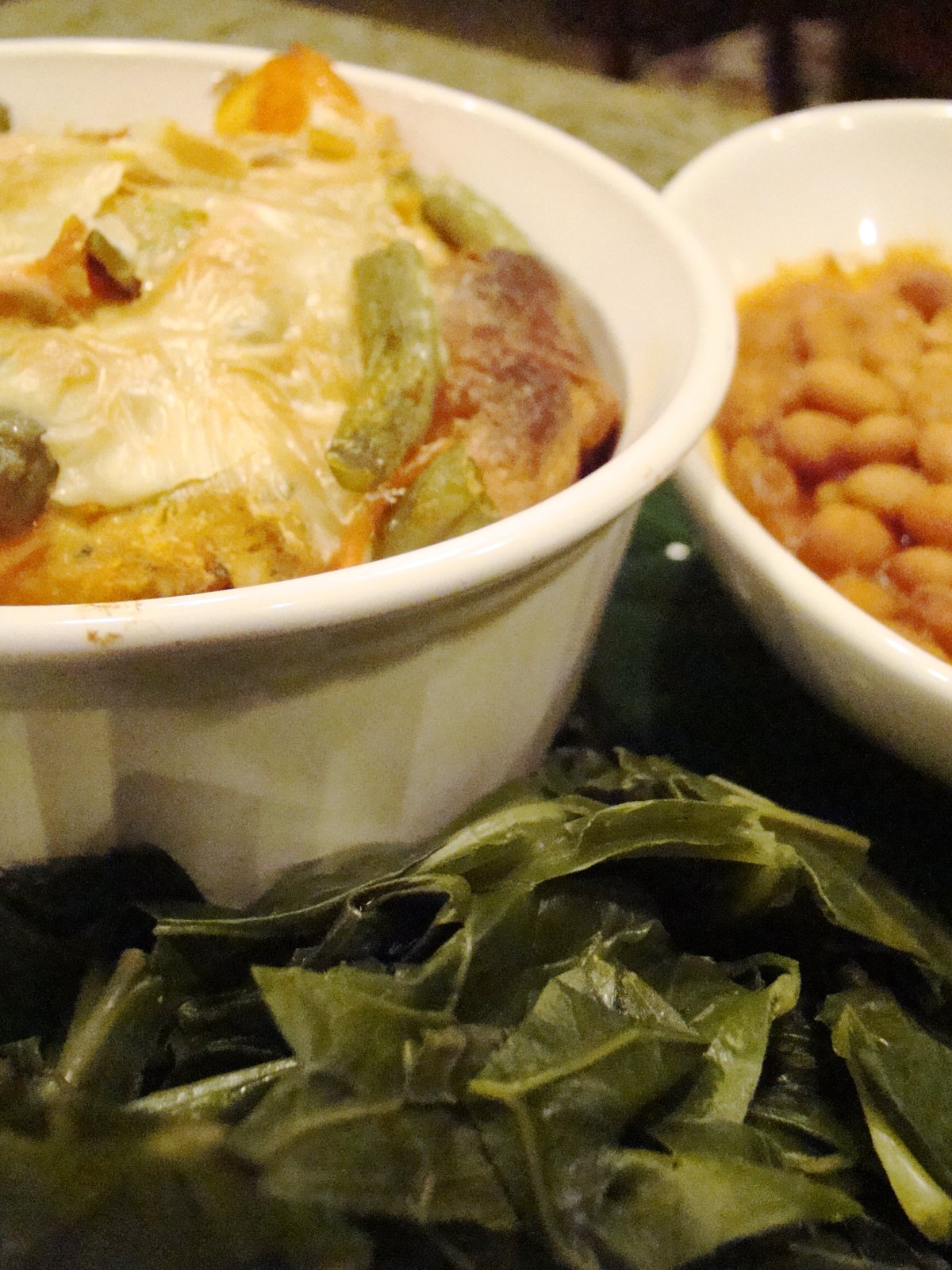 Collard greens beside beans