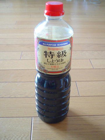 A Japanese soy sauce bottle whose label carries the 特級 special-grade mark and the 本醸造 brewing designation
